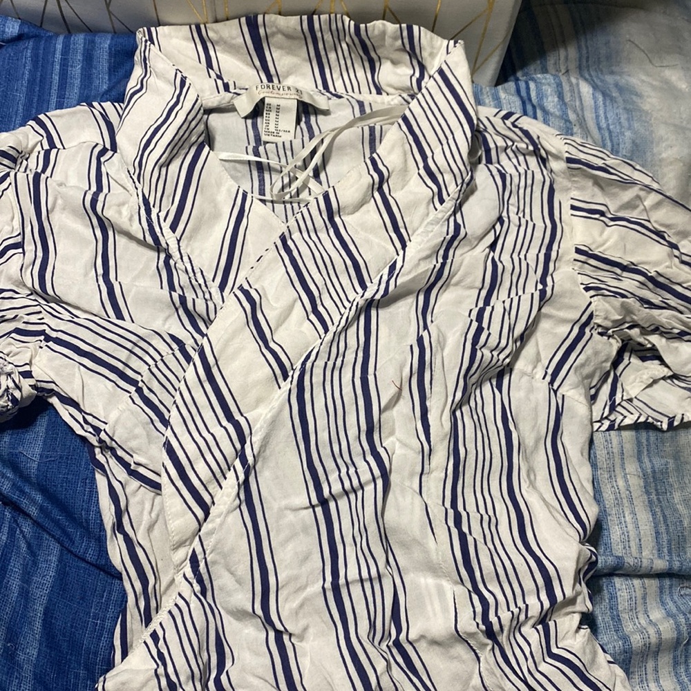 Cute wrap around shirt great for the beach size medium from forever 21